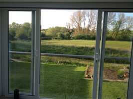 Glass Juliet Balcony looking our from kitchen in Berkshire