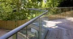 Glass Balustrades Review from Robertsbridge, East Sussex. Product: Balcony 2 system glass balustrade. Colour finish: Royal Chrome Anodized. Glass: 10mm Clear Toughened.