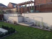 Glass Balcony Review.  Balcony 1 system glass balustrade. Very impressed with the quality and overall look of the installed glass balustrade. Really enhances the garden from all aspects.