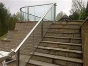 Glass Balustrade for stair runs, staircases and for raked runs.  What solutions are possible?