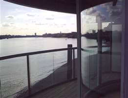 Curved balcony 1 silver balustrade with a view of the Thames