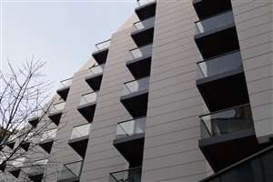 Looking up at some of the balconies in the Baltimore Wharf project with Royal Chrome handrails