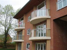 four curved glass balconies Littleover, Derbyshire