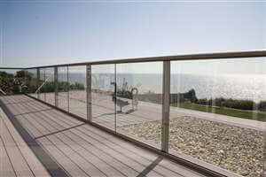 Bronze balcony by the sea with geese in the view