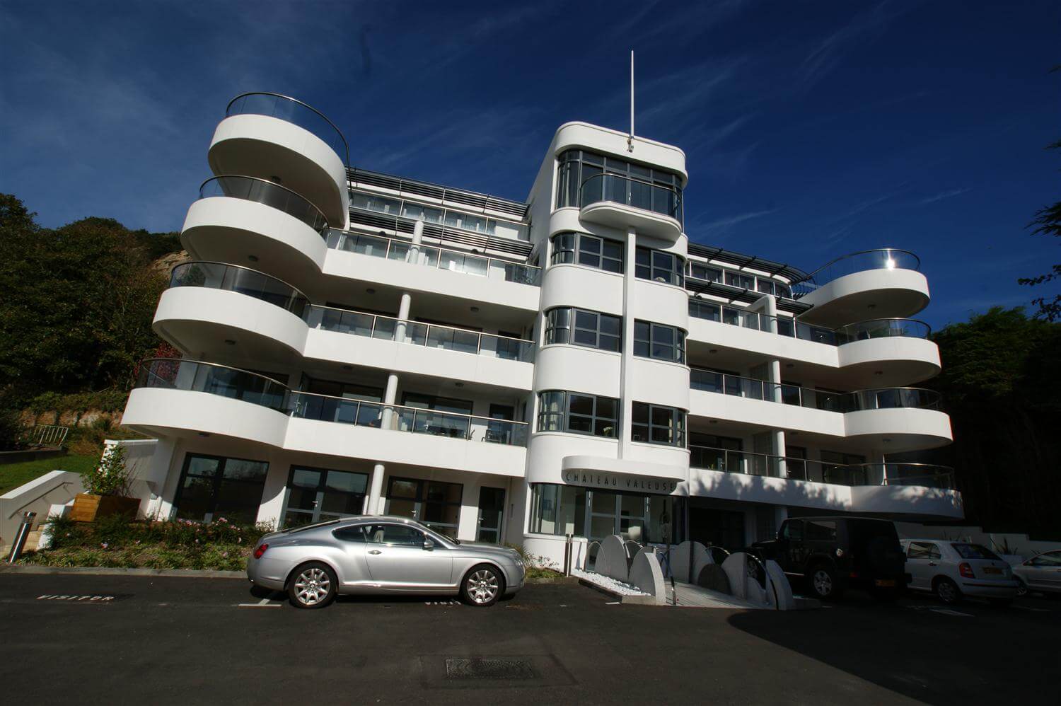 Curved Royal Chrome balconies on Chateau Valeuse