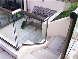 Anodised aluminium and glass stair baluster
