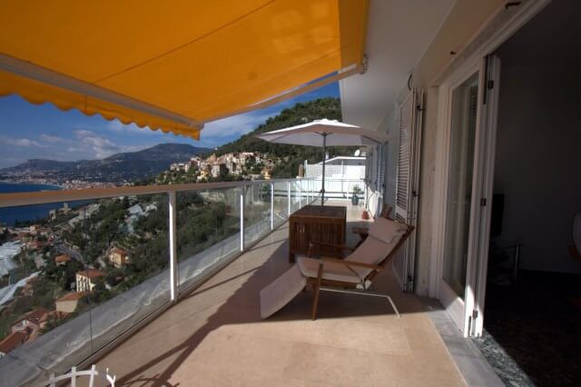 White balustrade with an amazing view and awning