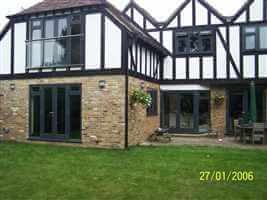 Tudor style house with Royal Chrome Juliet balcony