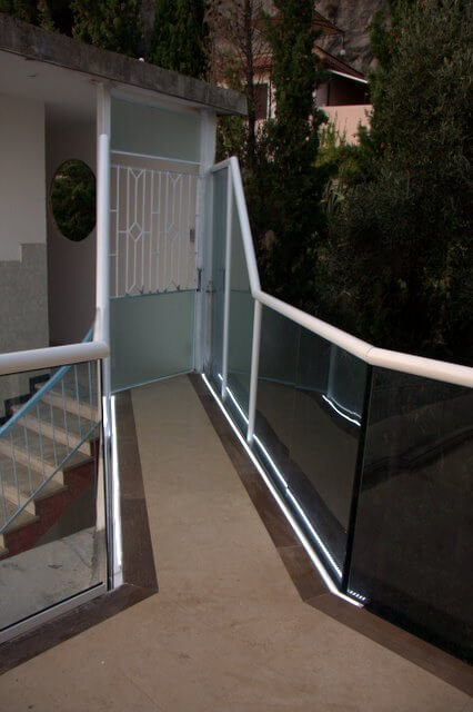 White balustrade with privacy screens