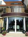 Curved doors and tinted Glass Balustrading adds spaces and privacy to Portsmouth