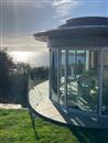 Balconette’s curved door realises architect’s vision in ‘the best spot in Cornwall’