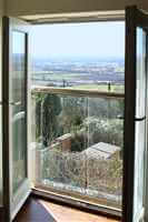 View through Juliet balcony to the beautiful countryside