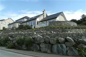 Royal Chrome balconies between stone walls