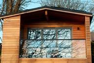 Glass Balcony Review. Balcony 2 system glass balustrade. Colour finish: Royal Chrome Anodized. Glass: 10mm Clear Tough with BalcoNano® Self-Cleaning Coating both Sides.