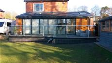 Barry Hazard installed a beautiful 14-metre-long Balconette balustrade on the back of a new kitchen extension with a little help from his wife Ann.