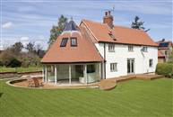 Curved Glass that is Double glazed allows the sun light and heat to pass through but keeps the heat from escaping out, reducing the need for heating.