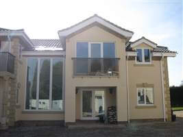 Bronze handrail, tinted glass Juliet Balcony