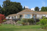 Balconette's 45 metre long Glass Balustrade transforms Berkshire home replacing a wooden balustrade that blocked beautiful views.