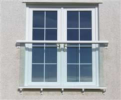 White Juliet balcony with clear glass