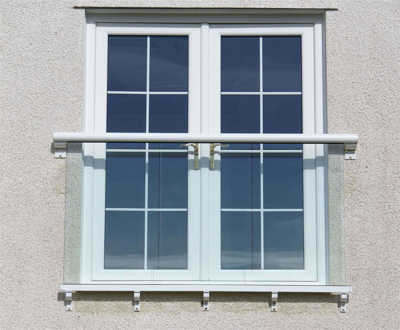White Juliet balcony with clear glass