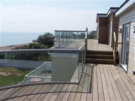 Silver curved and straight balcony on the seafront