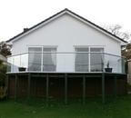 Ray changes his old wooden balustrade to Balconette's glass balustrade at home in Bideford