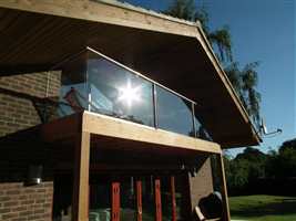 Sun shining on clear glass Royal Chrome Juliet balcony