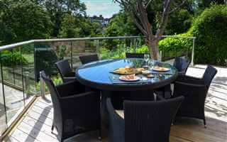 Glass Balustrade and centre piece table and chairs