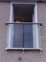 Royal Chrome Juliet balcony on pebble dash house