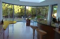 Beautiful curved glass sliding doors at a house in Epping Forest