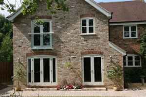 Pretty house with white Juliet balcony