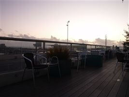 looking out at the sundet from a large balcony on the seafront