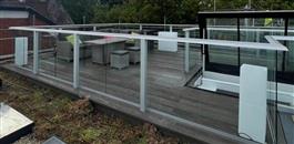 Do balustrade fixings affect flat roof warranties? Learn how membrane penetrations can impact waterproofing guarantees and terrace design.