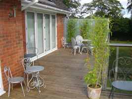 Glass Balustrade with screens giving privacy to balcony