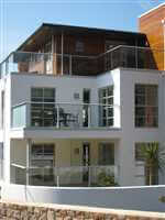 Three levels over white balconies on a beautiful house