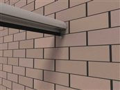 Why fix glass balustrade handrails to the wall? What is the advantage?