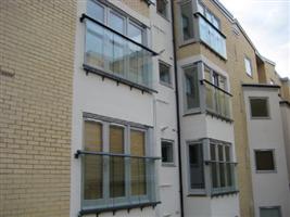 glass juliette balconies in heme