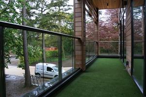 Glass Balustrade between pillars on balcony