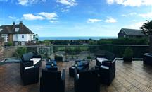 Balconette's Glass Balustrade is the focal point of the couple's refurbished home, which makes the most of stunning sea views.