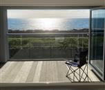 With no posts to obscure the view, this simple, yet stylish Balconette balustrade near Whitehaven in Cumbria creates a seamless connection to sunsets and the sea.