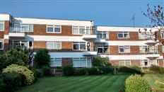 Old, non compliant balconies are replaced with new Glass Balustrades supplied by Balcony Systems. New Glass Balconies increase farmland views.