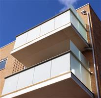 Passthrough glass balcony