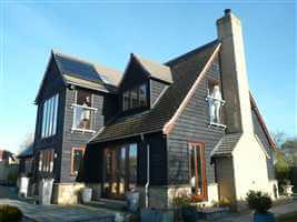 Beautfully designed house with two Silver handrail Juliet balconies