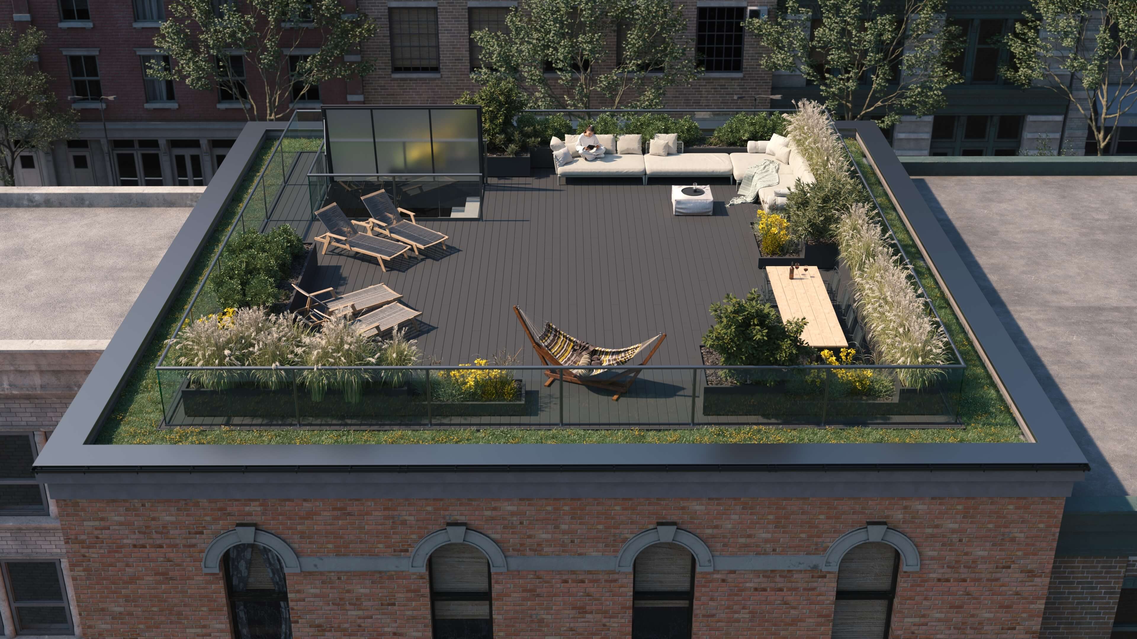 Rooftop patio terrace with glass balustrades and outdoor seating