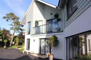 glass balustrade side of house