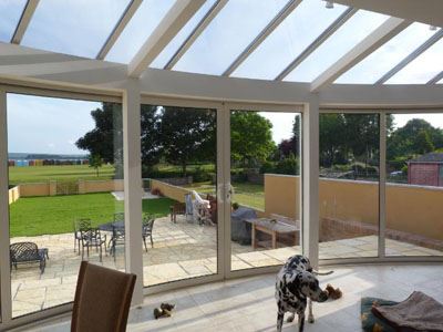 Curved Glass Doors installed in a conservatory
