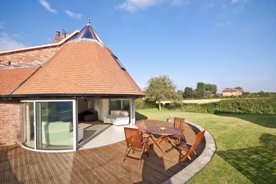 Cone shaped building with curved glass doors