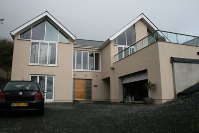 Orbit Glass Balustrade installed on a modern house.