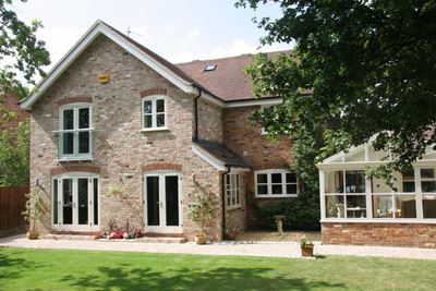 Pretty house with a White Orbit Juliet Balcony