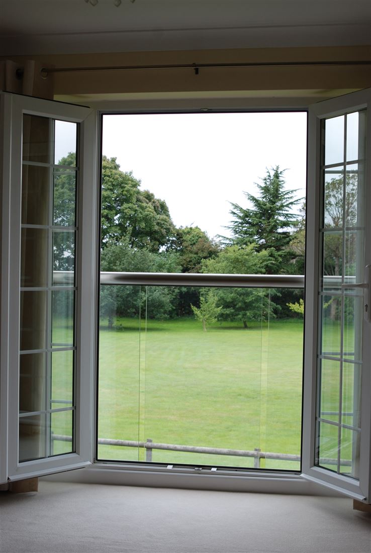 Garden view from a Royal Chrome Orbit Juliet Balcony